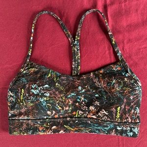 Lululemon pink blue yellow floral Flow Y bra size 4